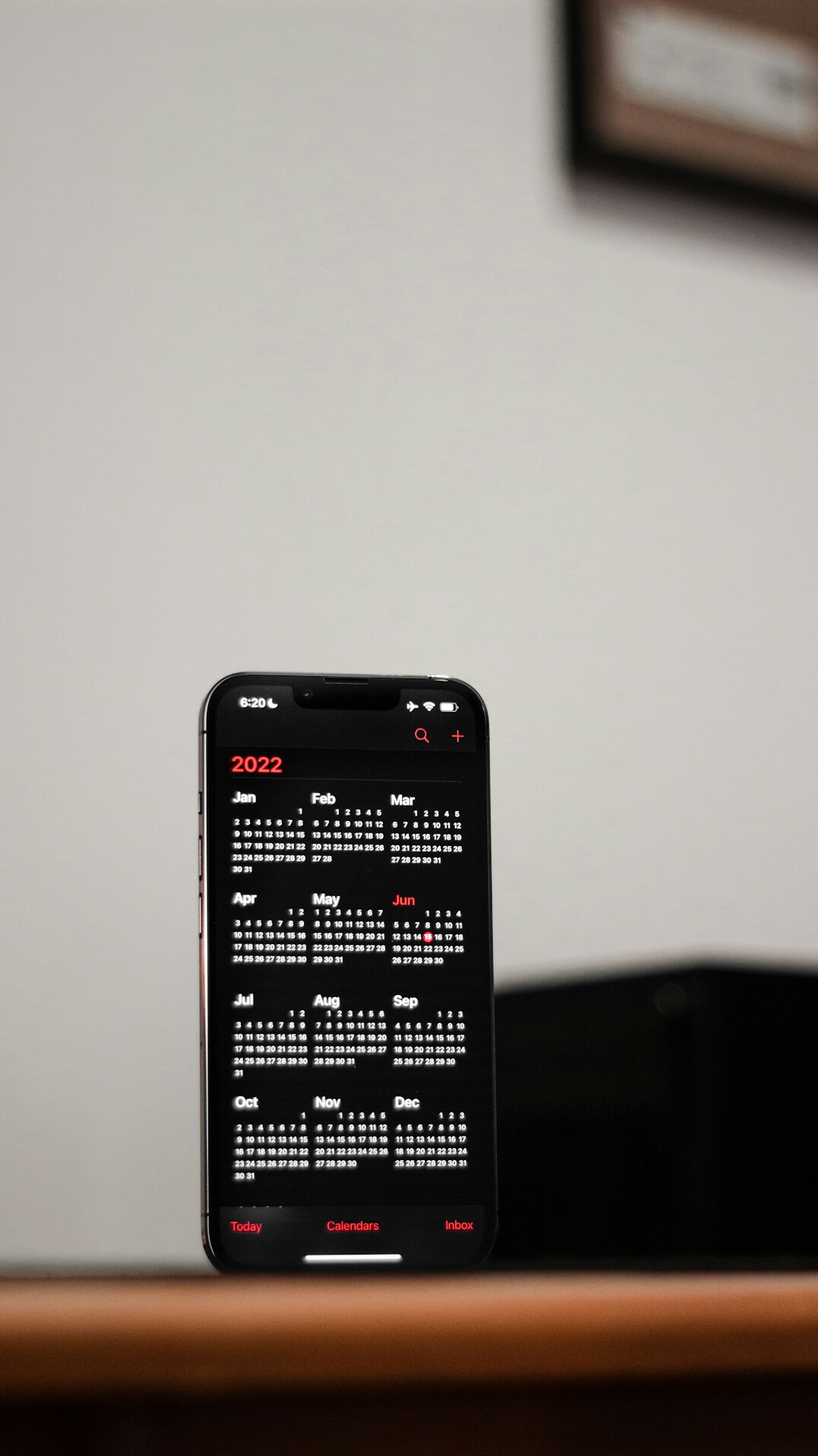 Staff member scheduling an appointment on a tablet calendar